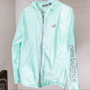 Brand New 💙 New Balance Travel Raincoat